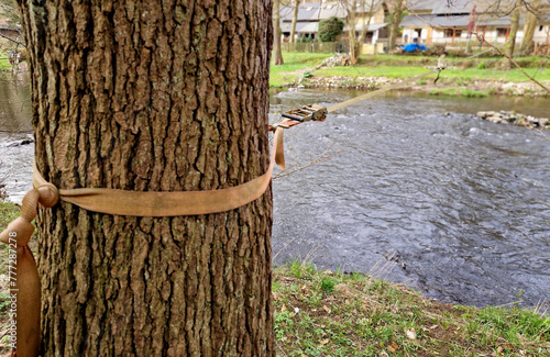 Canvas Print Slackline, or slack for short, is balancing, walking, and jumping on a strap attached between two points, such as trees