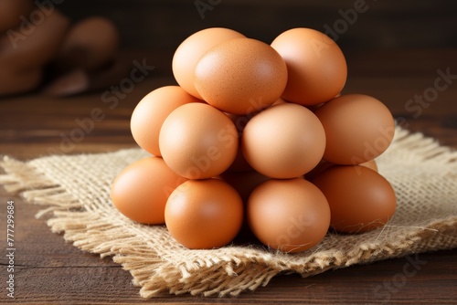 pile of brown chicken eggs on a table