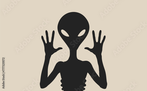 Silhouette of an alien figure with raised hands