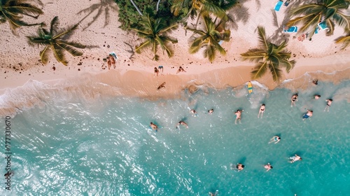 Aerial view of ocean waves meeting the sandy shore, capturing the essence of a vibrant summer beach.