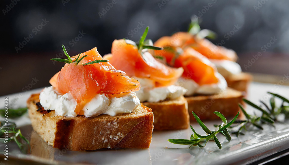 Close-up of toasted bread with smoked salmon and cream cheese. Tasty food. Delicious snack. Close-up of toasted bread with smoked salmon and cream cheese. Tasty food. Delicious snack.