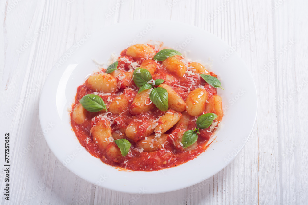 Italian homemade potatoes gnocchi with tomatoes sauce Italian homemade potatoes gnocchi with tomatoes sauce