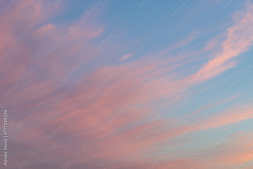 A pink and blue sky at dusk