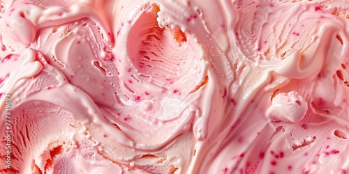 Top view of an ice cream pink peach colored from a swirl pattern in a closeup shot.