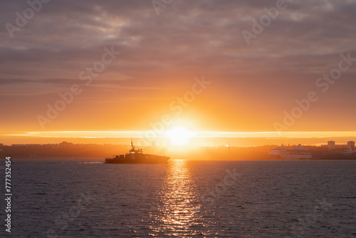 A military boat approaches Tallinn at dawn. © Dmitri