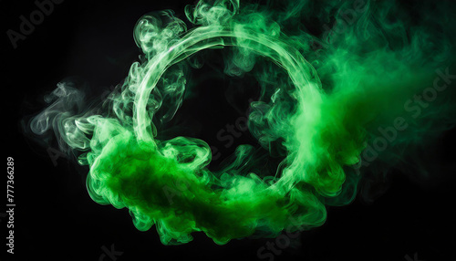 Green smoke in form of circle isolated on black background.