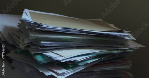 Large pile of papers dropped on floor, Too much work
