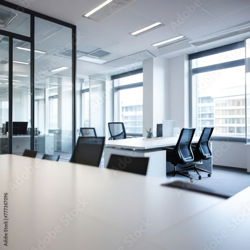Empty table top on blurred background inside office. Mockup for design.