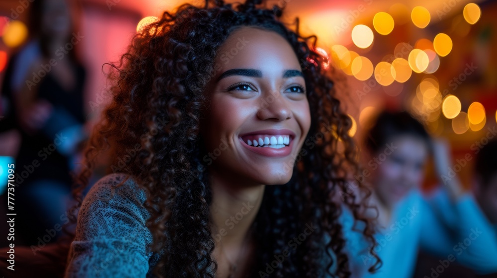 A woman smiling while sitting in a room with other people, AI A woman smiling while sitting in a room with other people, AI