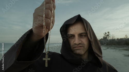 The Religious Spirit Of The Holy With Crucifix In His Hand