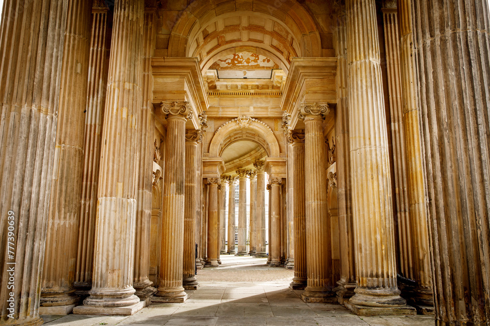 Architectural ensemble in Baroque style, columns and arches.