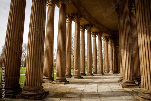 Set of classical Corinthian columns, adorned with intricate carvings, standing tall