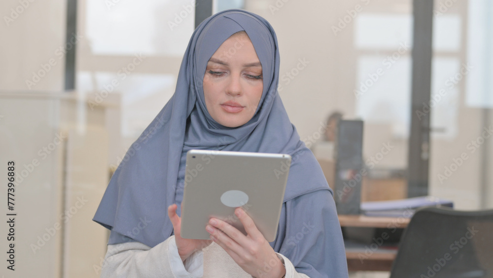 Portrait of Arab Woman Working on Digital Tablet Portrait of Arab Woman Working on Digital Tablet