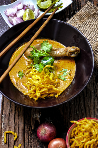 Khao Soi Thai Curry soup isolated in black background