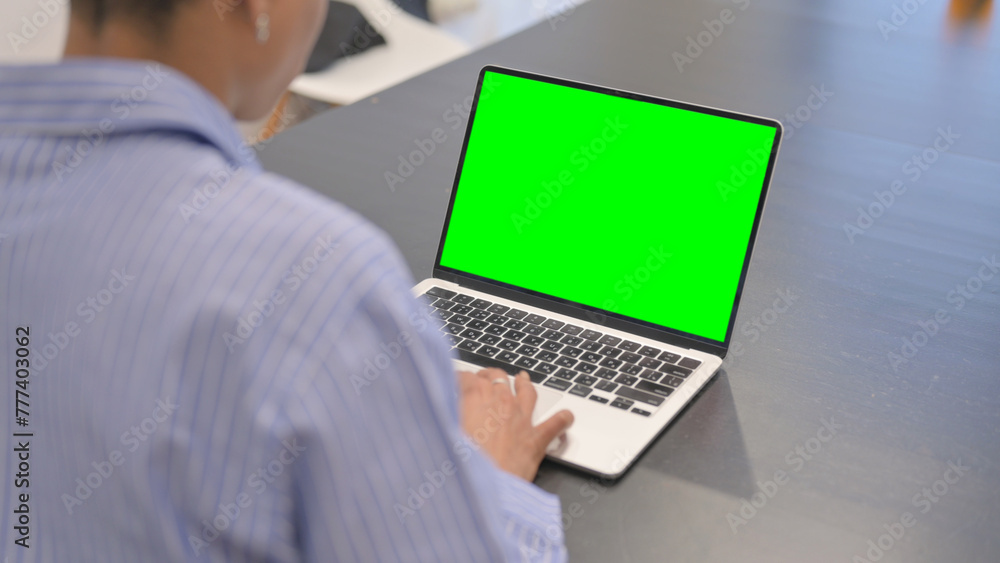 African Woman Working on Laptop with Green Screen African Woman Working on Laptop with Green Screen