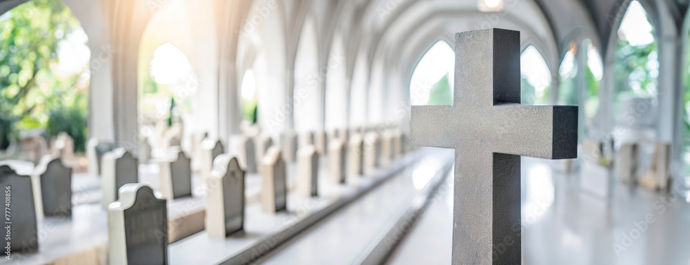 A stone cross stands prominently in a chapel with arched corridors. A symbol of faith dominates a bright, architecturally temple. Panorama with copy space. A stone cross stands prominently in a chapel with arched corridors. A symbol of faith dominates a bright, architecturally temple. Panorama with copy space.