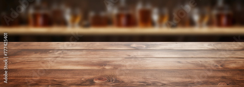 Beer bottles with long neck and blank label mock-up in blurred bar interior photo