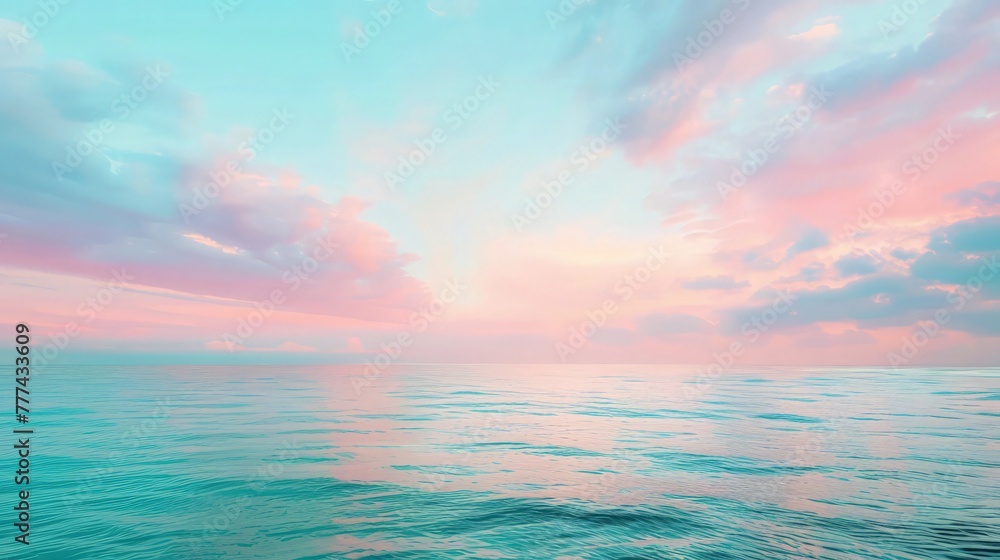 A broad, tranquil ocean scene with a sky awash in a spectrum of colors, from soft pink to deep blue, during sunrise.