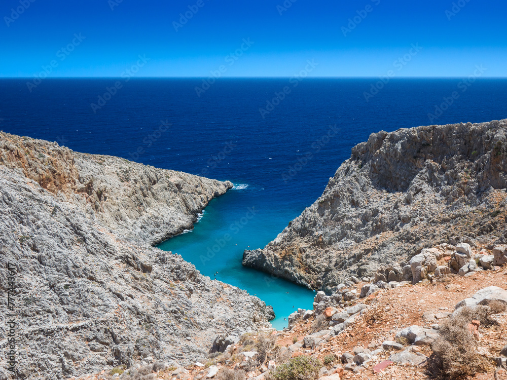 Beach with clear water between cliffs (Seitan Limania, Crete, Greece) Beach with clear water between cliffs (Seitan Limania, Crete, Greece)
