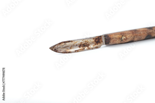 Old, dirty and rusted scalpel tip, isolated on white background