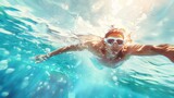 Nuotatore esegue una bracciata perfetta sotto la luce del sole