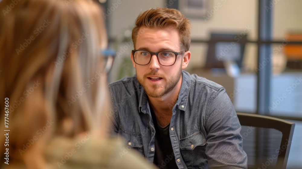 digital Marketing Specialist talking to team and Marketing Projects. A diverse team of specialists works in a modern office. digital Marketing Specialist talking to team and Marketing Projects. A diverse team of specialists works in a modern office.