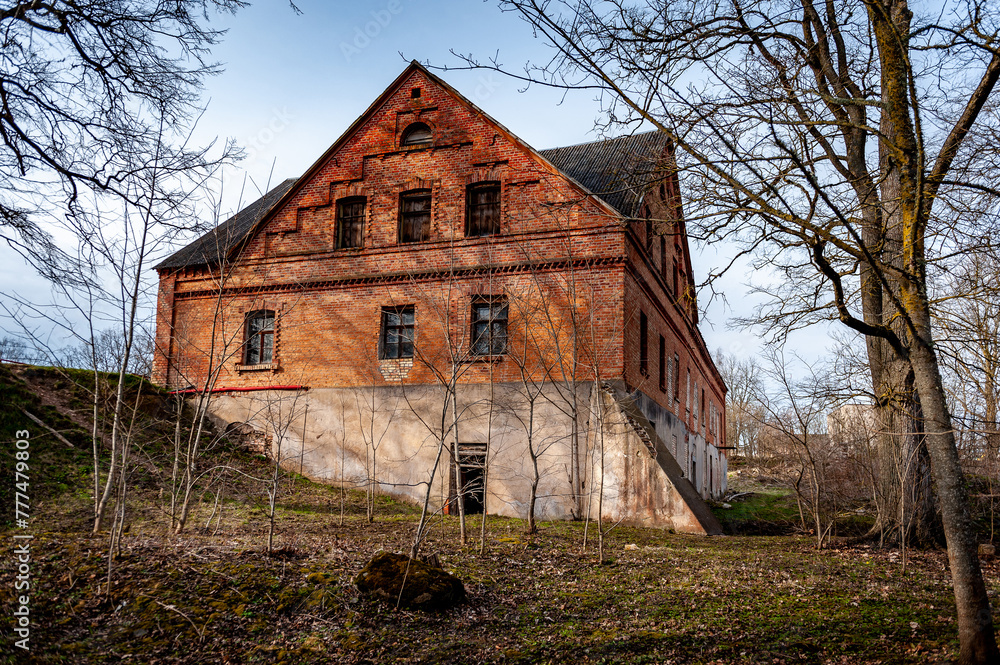 Obraz premium Old brick water mill building. Berkenes, Latvia.
