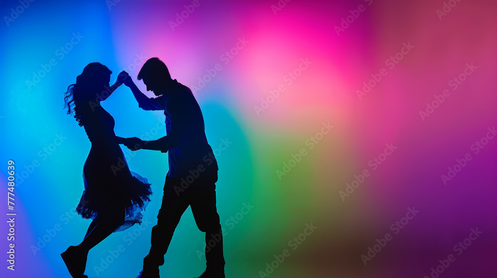 silhouette of a dancing couple, colorful background