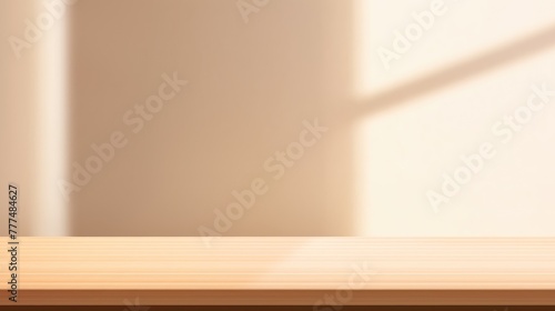 Empty room with soft sun light from window. Empty table top in front, beige wall background