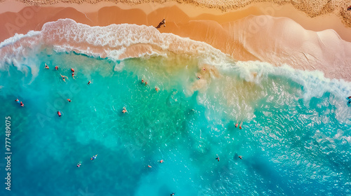 Aerial view of sunny beach scene with crystal clear water and vibrant beachgoers. Top view.