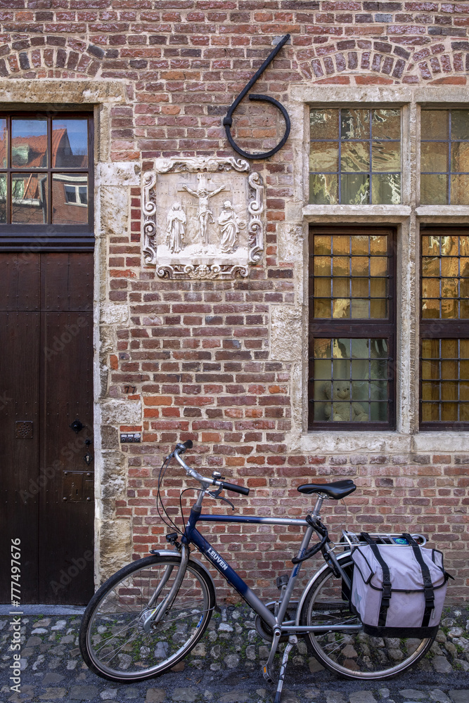 House and bike in Le Beguinage, Leuwen, Belgium