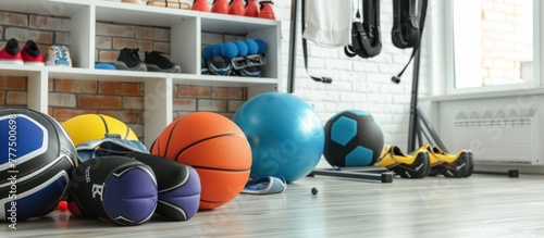 various kinds of sports balls in light room