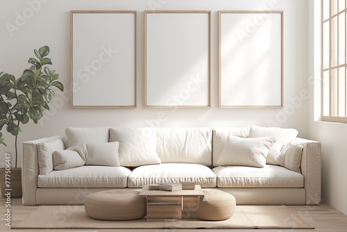 3 large thick white wood picture frames hanging on the wall in front of the sofa, neutral colors and tones photo