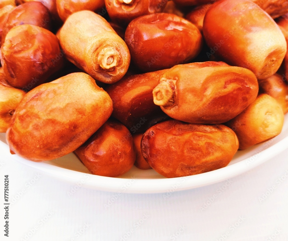 Date-palm fruit golden semi-dried zahedi irani dates in a bowl sweet organic food Iranian datepalms khajoor kurma zahidi phoenix dactylifera closeup view image stock photo Date-palm fruit golden semi-dried zahedi irani dates in a bowl sweet organic food Iranian datepalms khajoor kurma zahidi phoenix dactylifera closeup view image stock photo