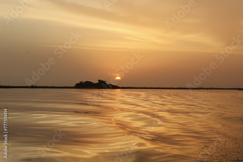 Sunset over the Saloum river delta in Senegal photo