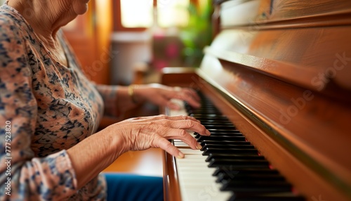 a happy female senior citizen playing the piano