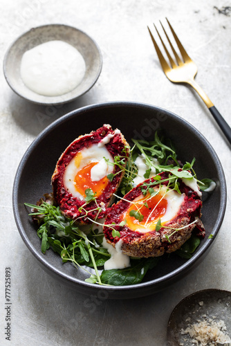 Vegetarian beetroot scotch egg with horseradish cream photo