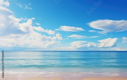 Sunny beach with clouds and clear sea