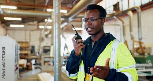 Logistics, black man and radio in warehouse for communication, delivery or distribution. Carpentry, inspection and male worker with transceiver for woodwork production, manufacturing or restoration photo