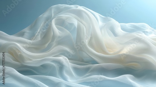  A white fabric, focused closely, against a blue backdrop; the fabric appears to be gently billowing in the blurred image of the wind