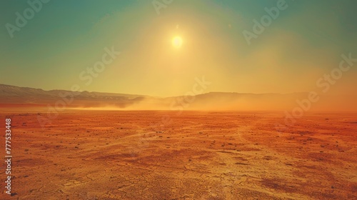 A desert landscape with a large sun in the sky. The sun is setting and the sky is a beautiful blue color © Sodapeaw
