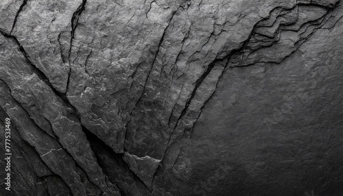 Rock texture with cracks black stone background with copy space for design.