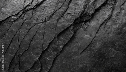 Rock texture with cracks,black stone background with copy space for design