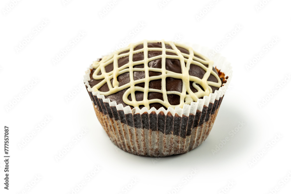 Chocolate muffin with white chocolate glaze isolated on white background. 