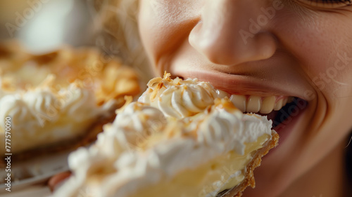 Close-up of person biting into creamy pie with visible taste enjoyment