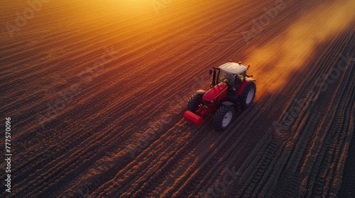 Aerial Shot of Tractor Working in Soybean Fields at Dusk