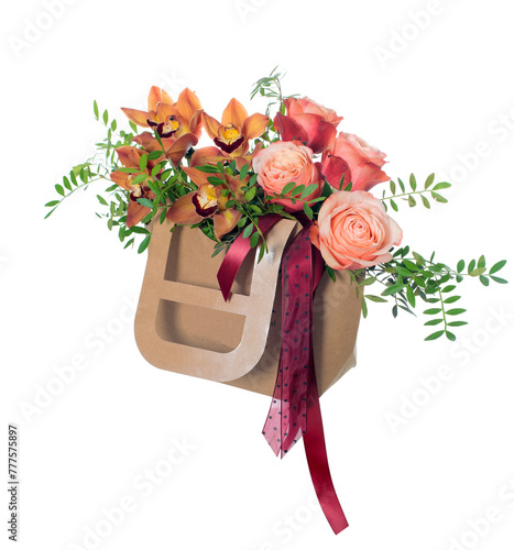 Bouquet of cymbidium orchids in a cardboard box. Isolated