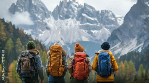 Group of Hikers Standing in Front of Mountain