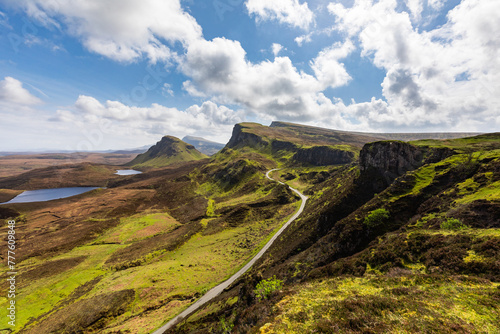 Majestic highland landscape with winding road
