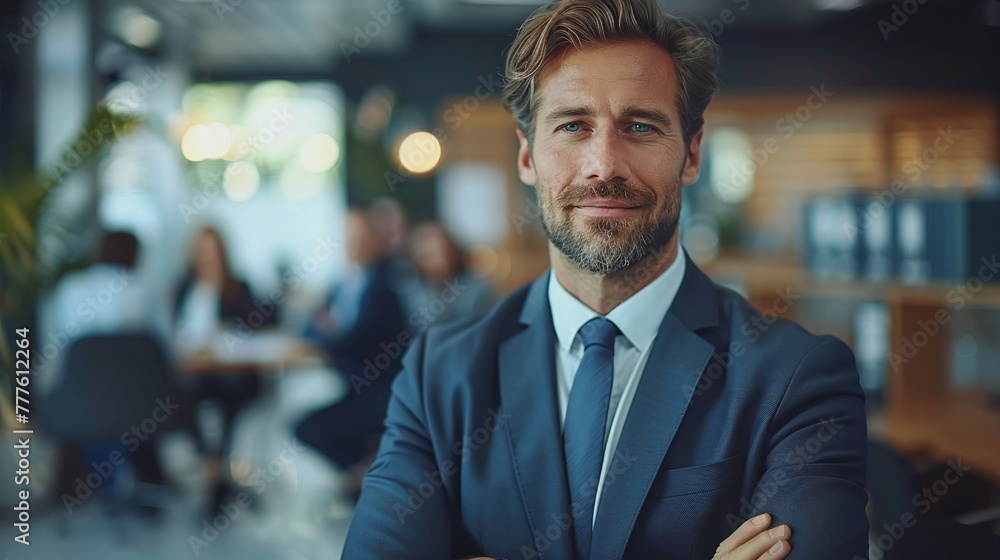 leadership in action: successful CEO executive standing with crossed arms in office leadership in action: successful CEO executive standing with crossed arms in office